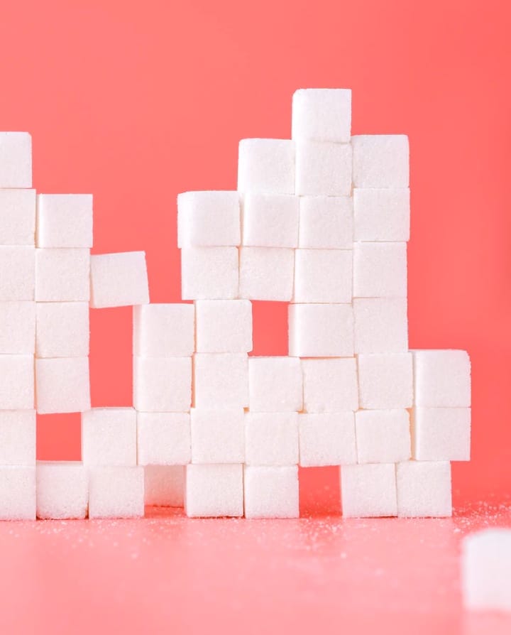 A wall of stacked sugar cubes.