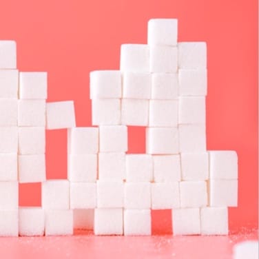 A wall of stacked sugar cubes.